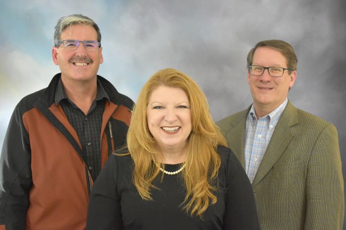 Brandi credits Engineering Senior Manager Max Wimmer (left) and Senior Director Daron Isbell (right) for their integral support.